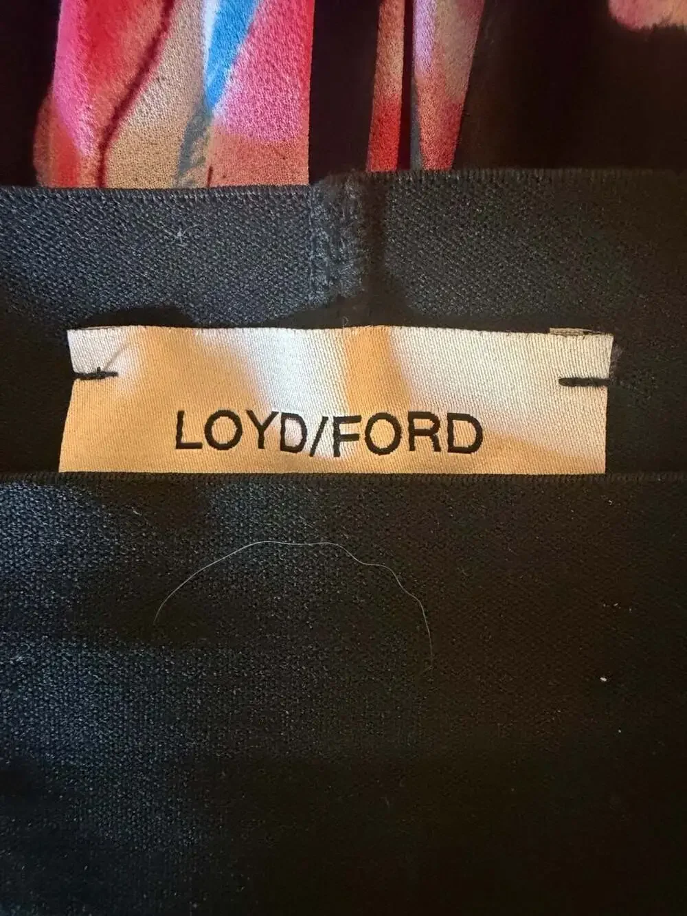 Loyd/Ford pleated midi skirt with black and pink lip print